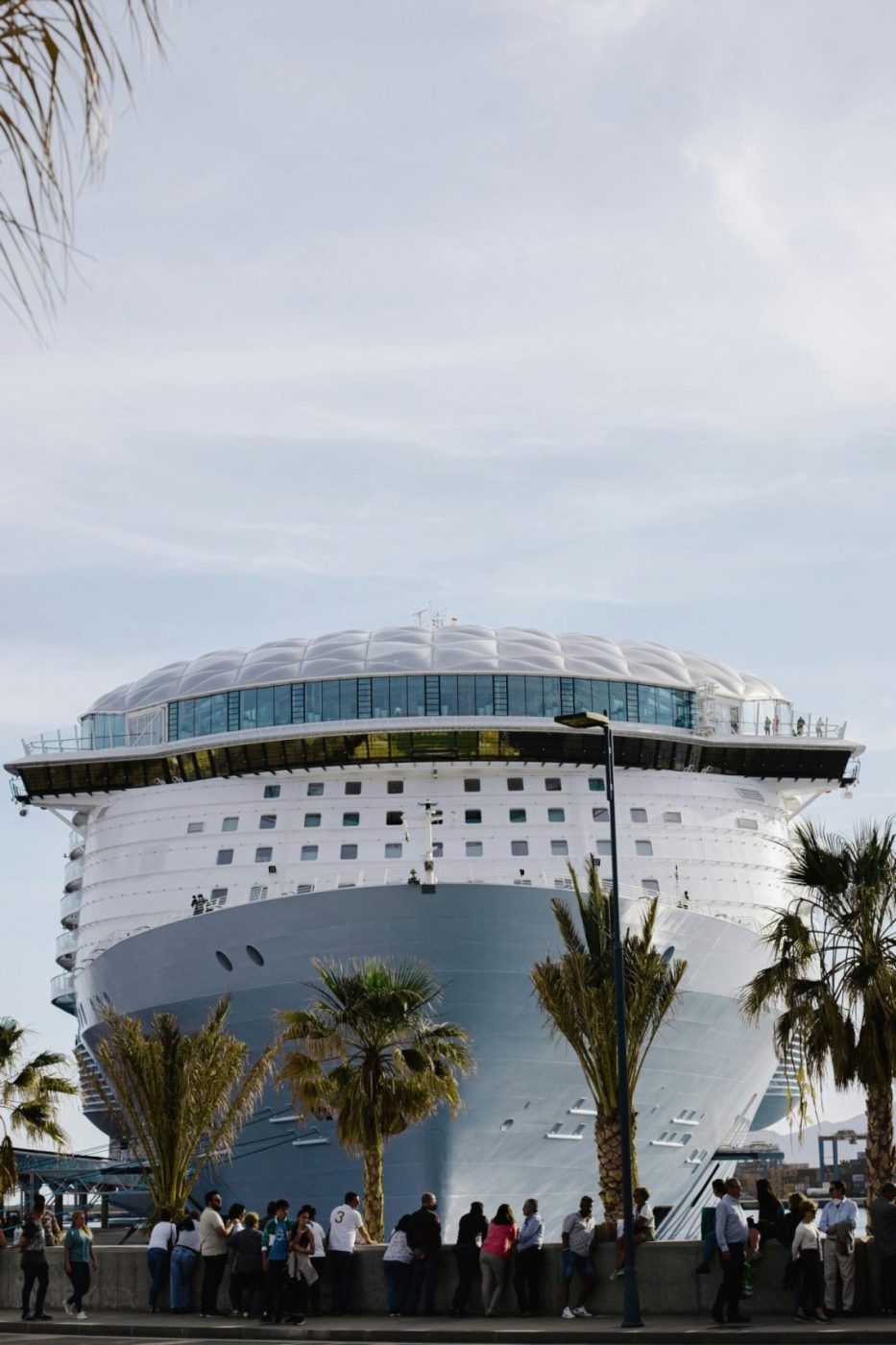 People watching big cruise ship 